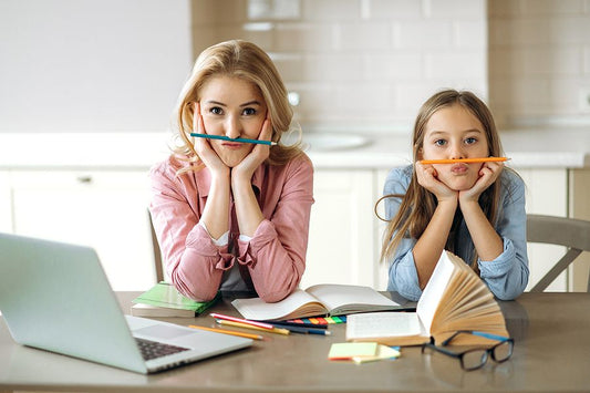 Mom and daughter having fun homeschooling children with ADHD