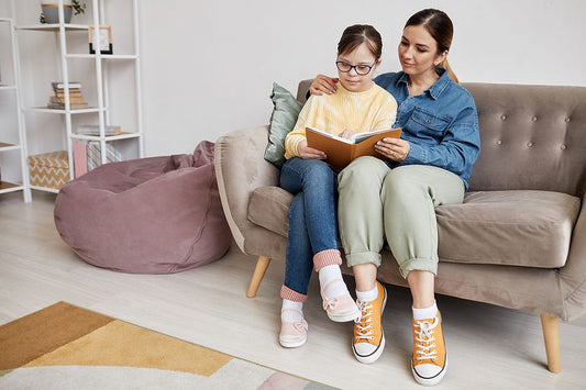 Homeschooling with autism for sensory-friendly environment mom reading with special needs daughter