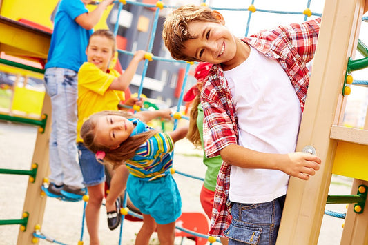 Homeschooled children playing together on a playground fostering social skills